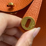 mini. lindy. classic orange and gold buckle top hand sewing custom