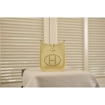 evelyne chick yellow silver buckle TC