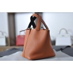 picotin18 classic orange with midnight blue TC leather on the wrist