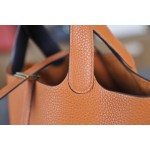 picotin18 classic orange with midnight blue TC leather on the wrist