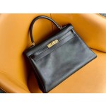 Kelly32 black gold swift leather
