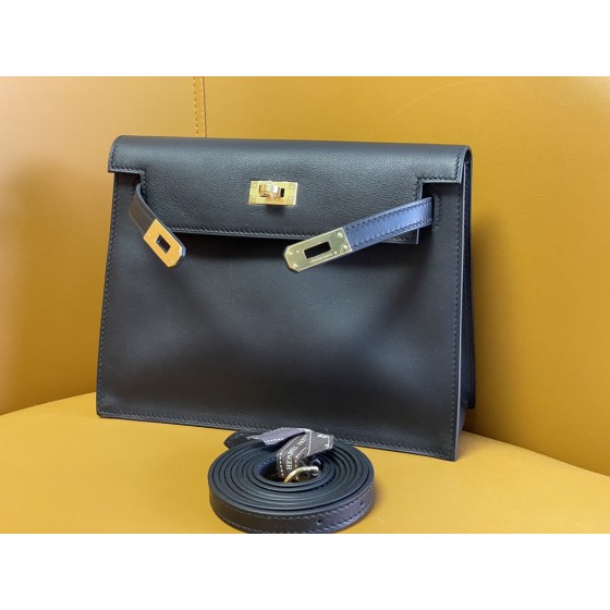 Kelly Danes black swift leather gold buckle