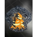 Givenchy full body tiger print paired with the latest quirky pumpkin head bird print