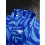 Givenchy full body tiger print paired with the latest quirky pumpkin head bird print