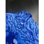 Givenchy full body tiger print paired with the latest quirky pumpkin head bird print