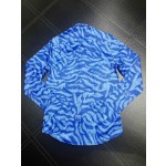 Givenchy full body tiger print paired with the latest quirky pumpkin head bird print