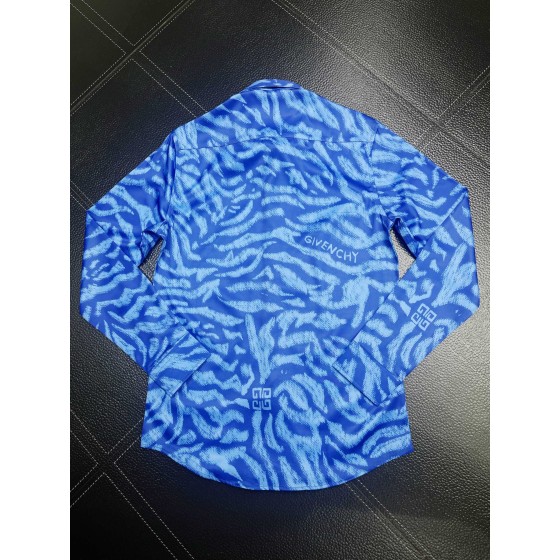 Givenchy full body tiger print paired with the latest quirky pumpkin head bird print