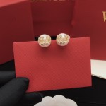 Valentino pearl earrings with V-shaped diamonds