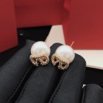 Valentino pearl earrings with V-shaped diamonds