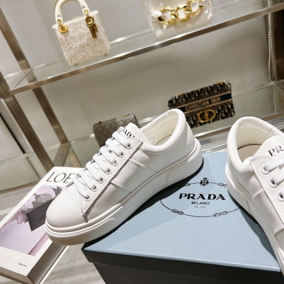 Prada thick sole small white shoes