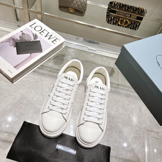 Prada thick sole small white shoes