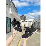 Louis Vuitton with four leaf clover pattern on the side of the shoe