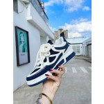 Louis Vuitton with four leaf clover pattern on the side of the shoe