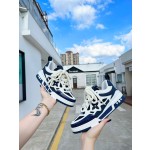 Louis Vuitton with four leaf clover pattern on the side of the shoe