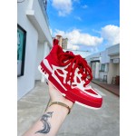 Louis Vuitton with four leaf clover pattern on the side of the shoe