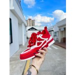 Louis Vuitton with four leaf clover pattern on the side of the shoe