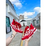 Louis Vuitton with four leaf clover pattern on the side of the shoe