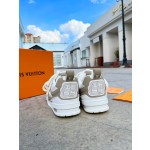 Louis Vuitton with four leaf clover pattern on the side of the shoe