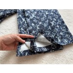 Louis Vuitton... blue camouflage floral denim pants