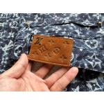 Louis Vuitton... blue camouflage floral denim pants