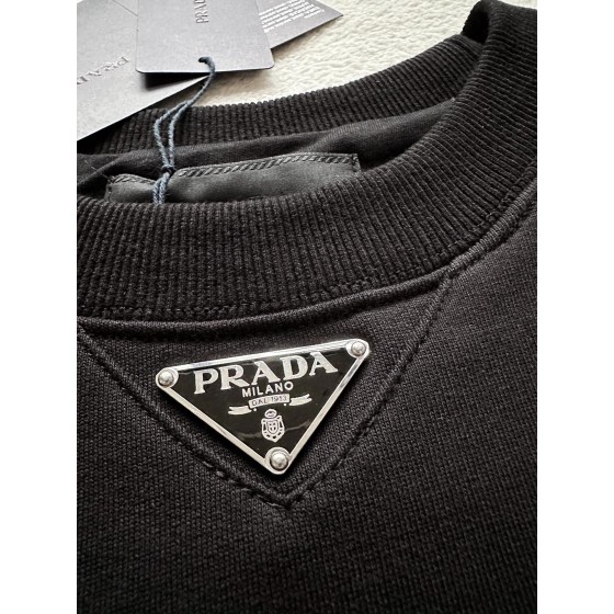 Prada's iconic iron brand hardware round neck sweater