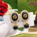 Gucci round black earrings