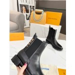 Louis Vuitton vintage cowhide patchwork boots
