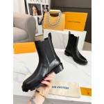 Louis Vuitton vintage cowhide patchwork boots