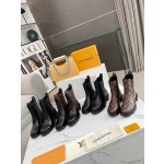 Louis Vuitton vintage cowhide patchwork boots