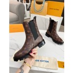 Louis Vuitton vintage cowhide patchwork boots