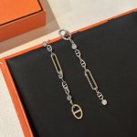 Hermes Pig Nose Asymmetric Tassel Earrings