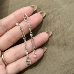 Hermes Pig Nose Asymmetric Tassel Earrings