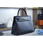 Kelly 28 black gold buckle with extreme pink French sheepskin inside