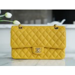 𝐂𝐇𝐀𝐍𝐄𝐋 Classic Flap washed cowhide is made from the most delicate newborn calves Washed fetal cow Medium Mango Yellow 🥭