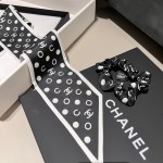𝐂𝐡𝐚𝐧𝐞𝐥 "Polaroid" 2-in-1 hair tie ➕ribbon 100% silk polka dot black and white