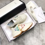 Gucci Pops This collection has a lot of flora and fauna elements Original material