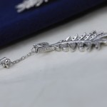 CHANEL🇫🇷Xiaoxiang Hollow Feather Stud Earrings Full Diamond Version Silver Needle