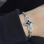 Louis Vuitton Four-leaf clover bracelet in platinum and sterling silver