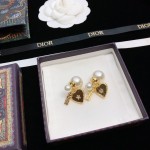 Dior stud earrings
