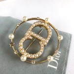 Dior CD brooch