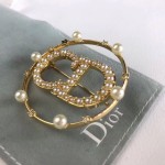 Dior CD brooch