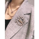 Dior brooch