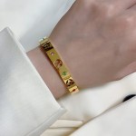 Louis Vuitton LV monogrammed openwork and gemstone bracelet