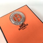 Hermes brooch