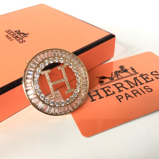 Hermes brooch