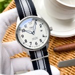 IWC- nylon canvas strap universal pilot automatic mechanical vintage racing themed chronograph