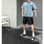 Prada…Triangle brand single-breasted washed light blue denim short-sleeved shirt jacket