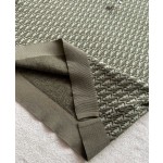 Dior's latest army green knitted jacquard Polo with absolute texture