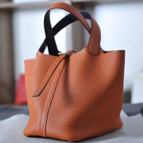 picotin18 classic orange with midnight blue TC leather on the wrist